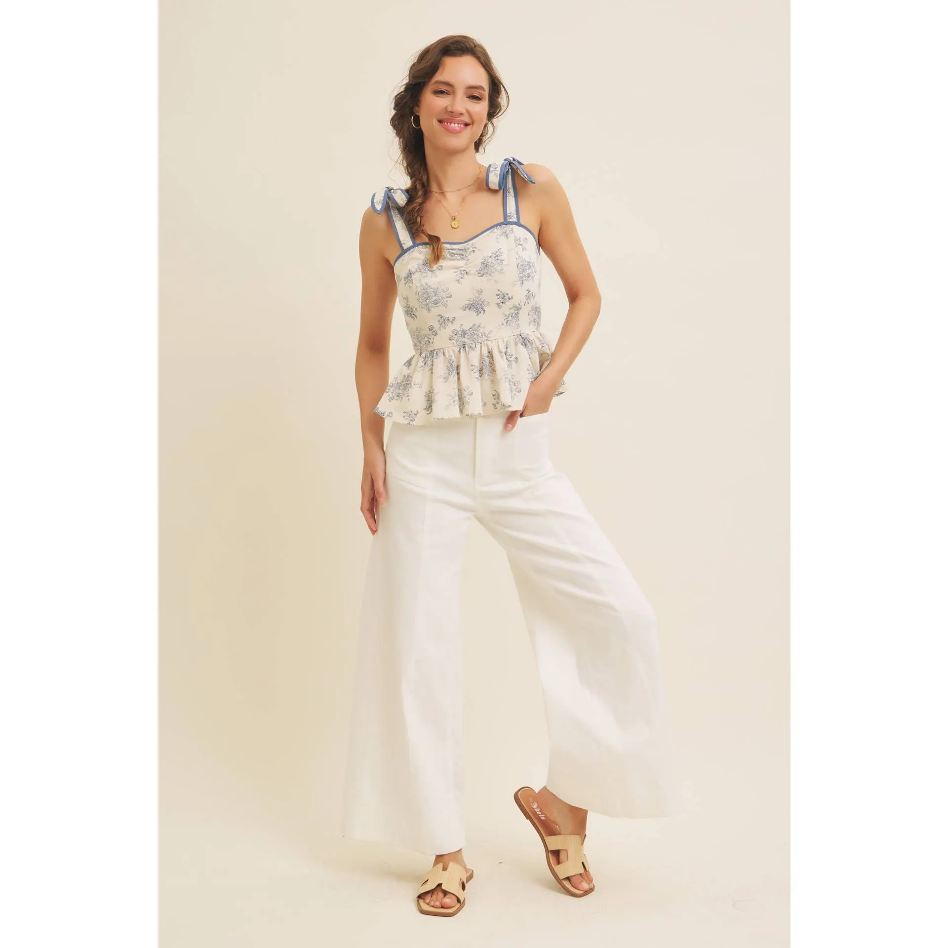 FLORAL PRINT COTTON LINEN SMOCKED PEPLUM TOP