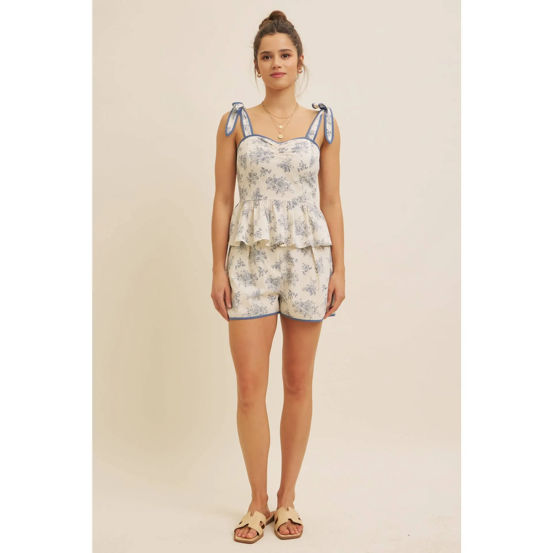 FLORAL PRINT COTTON LINEN SMOCKED PEPLUM TOP
