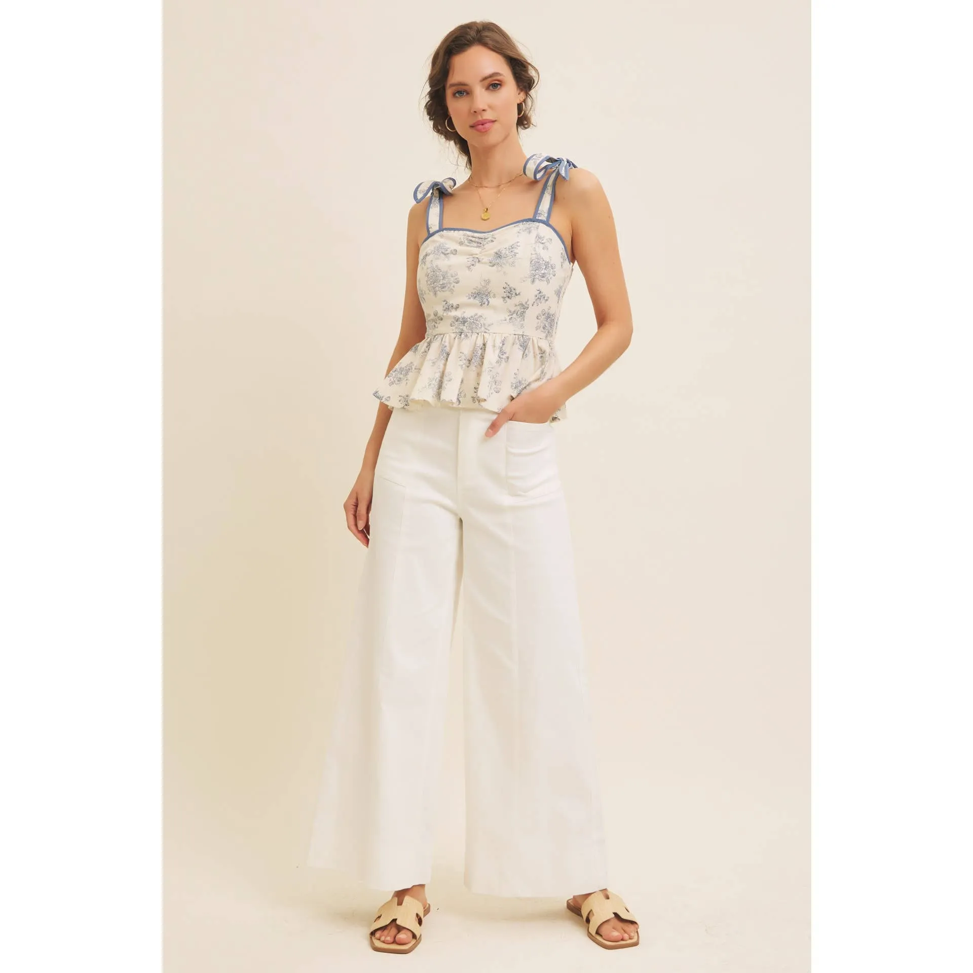 FLORAL PRINT COTTON LINEN SMOCKED PEPLUM TOP
