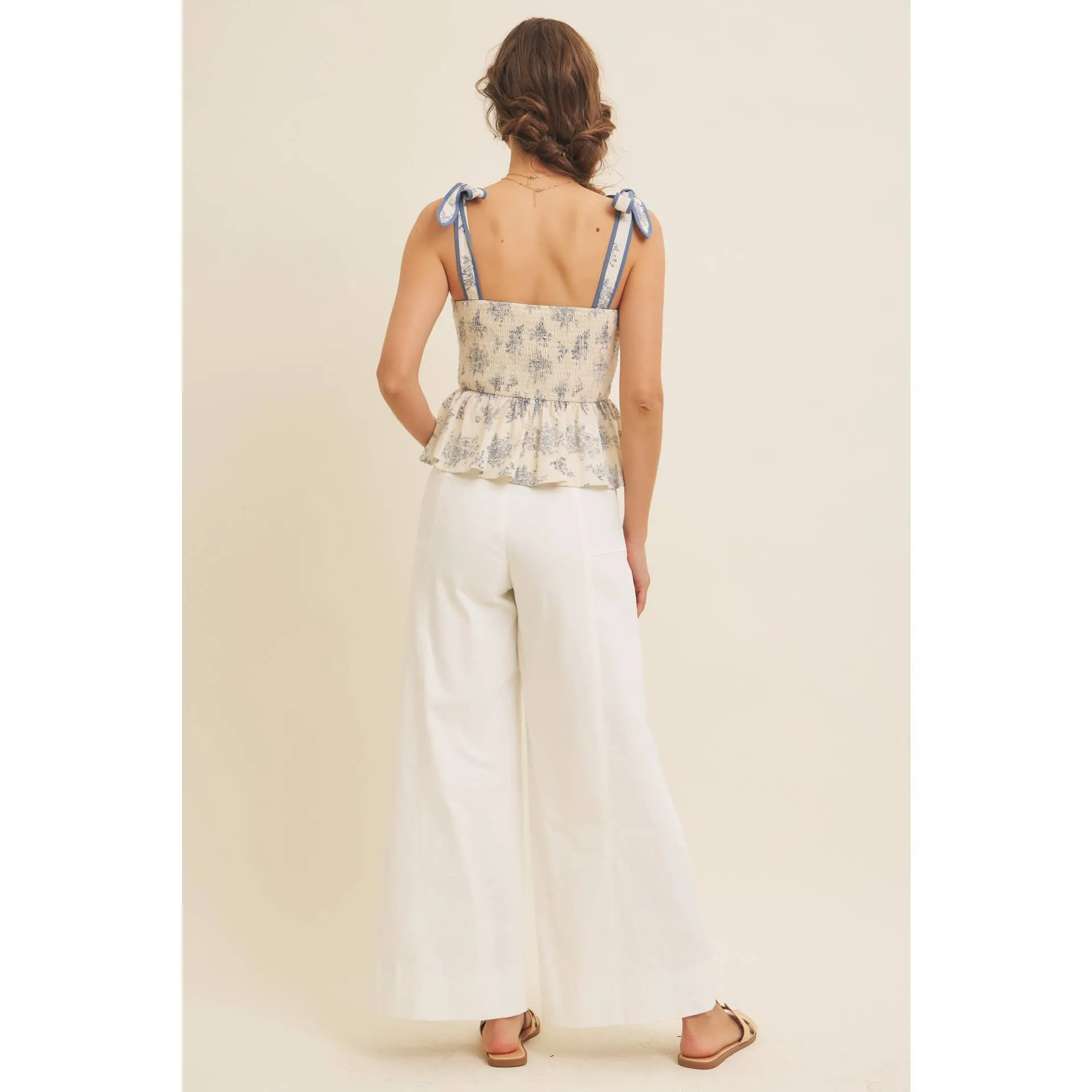 FLORAL PRINT COTTON LINEN SMOCKED PEPLUM TOP