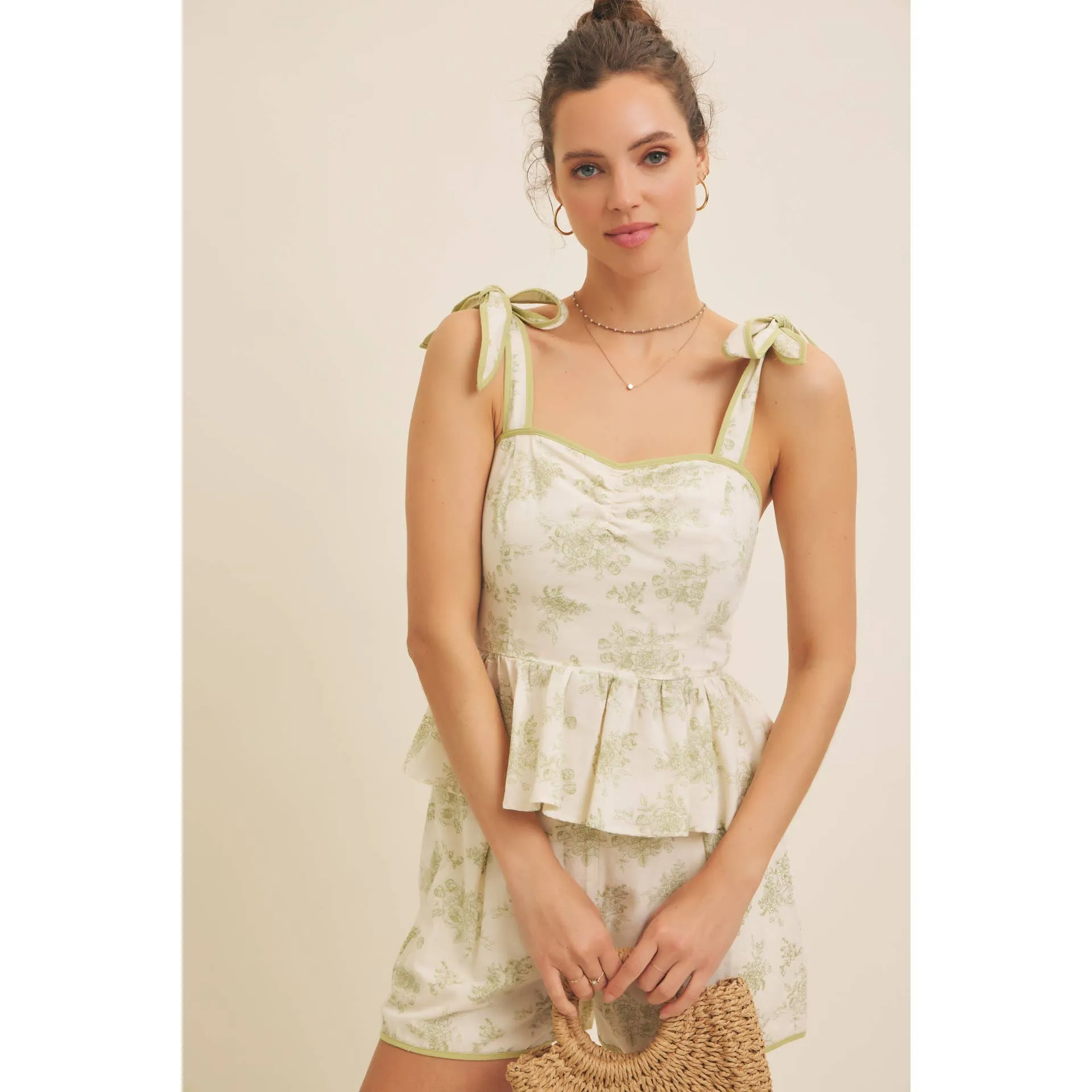 FLORAL PRINT COTTON LINEN SMOCKED PEPLUM TOP