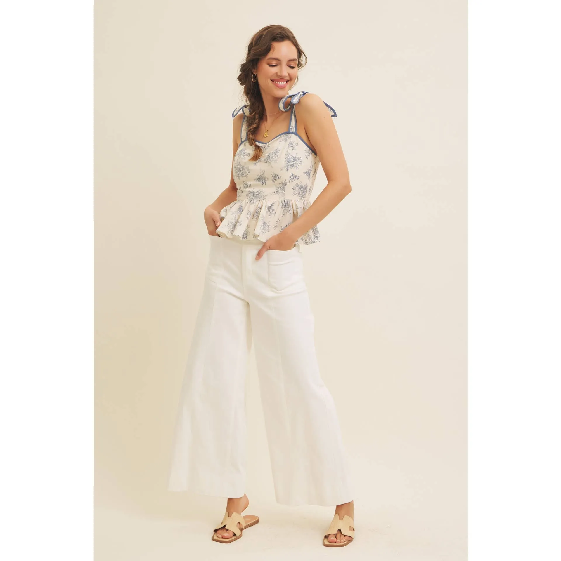 FLORAL PRINT COTTON LINEN SMOCKED PEPLUM TOP