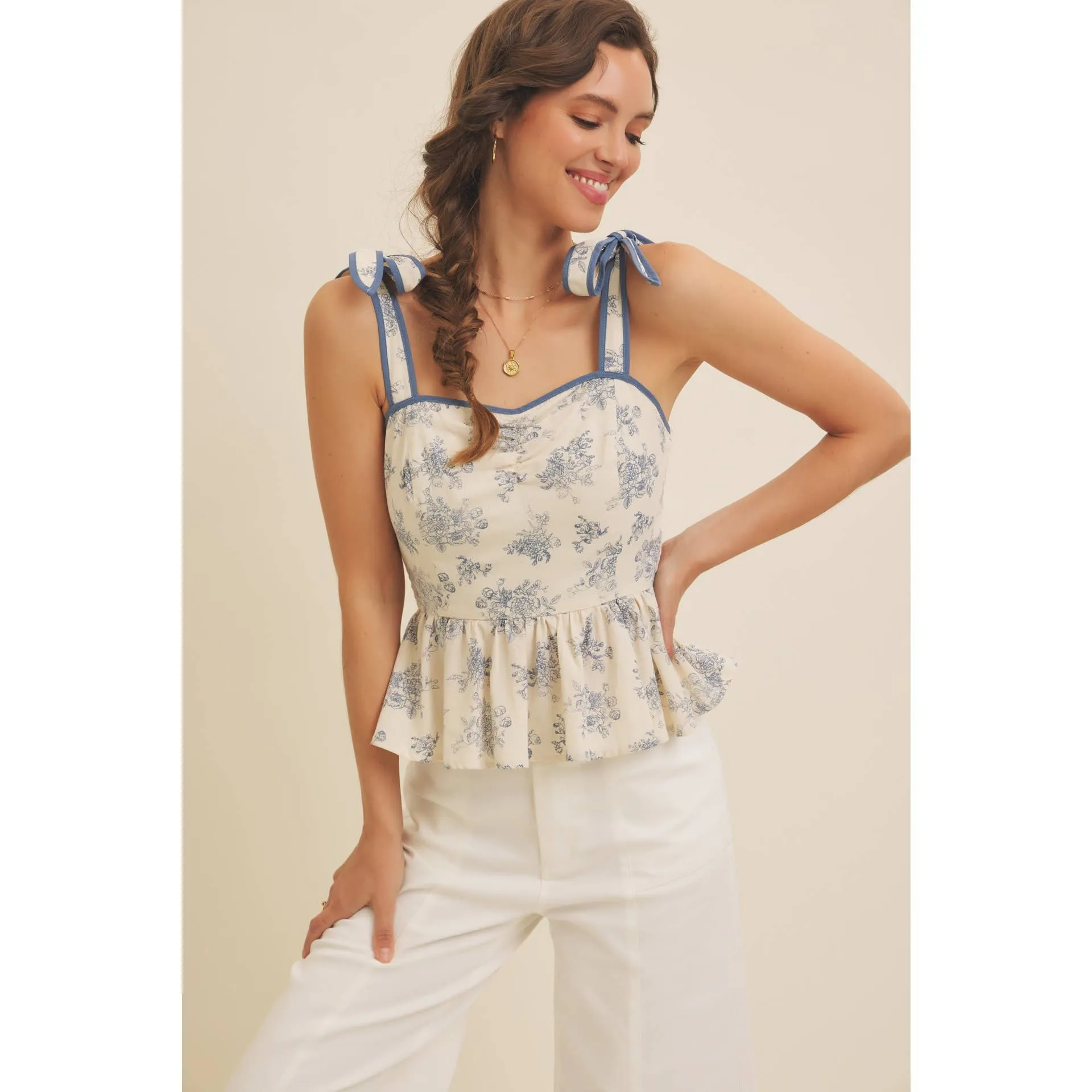 FLORAL PRINT COTTON LINEN SMOCKED PEPLUM TOP
