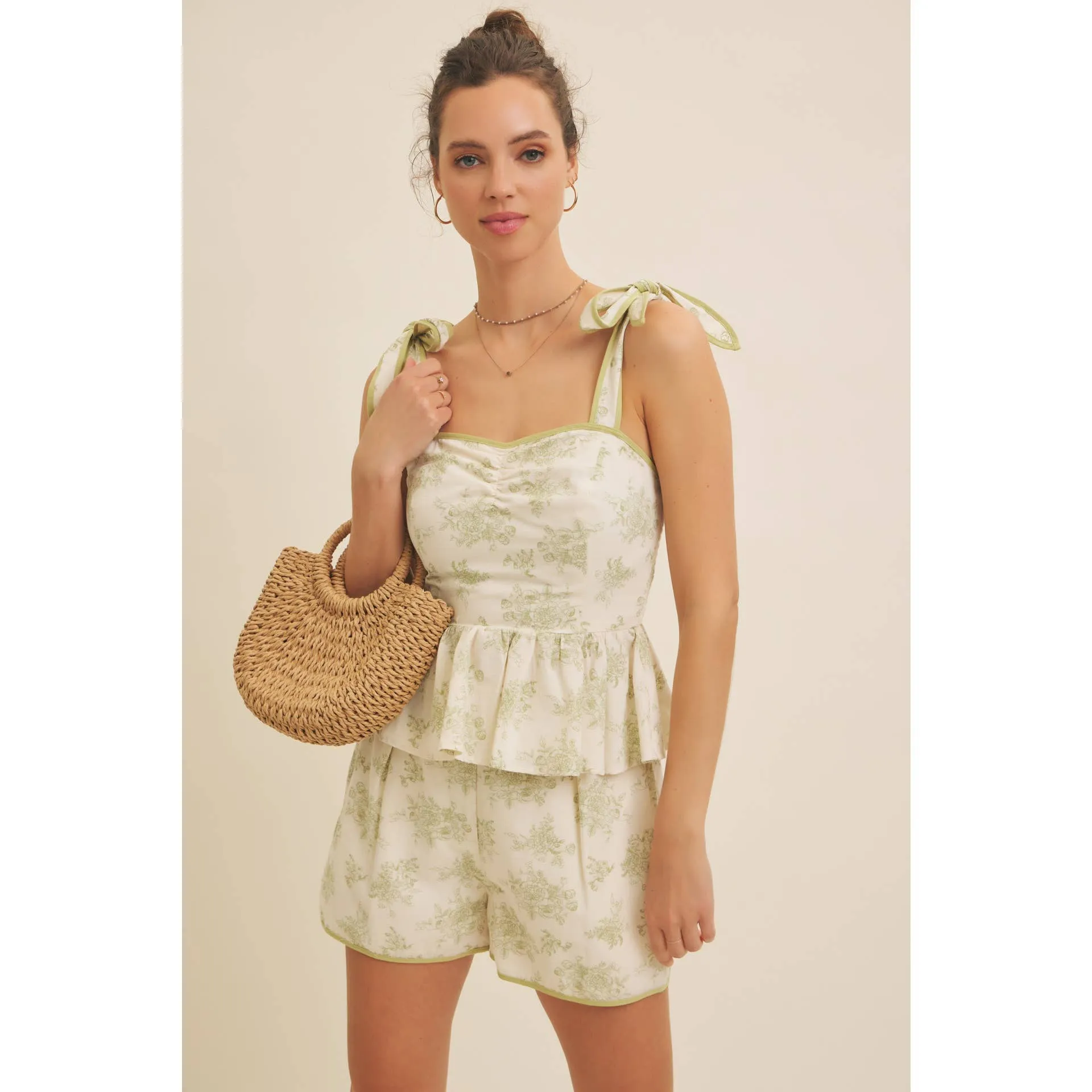 FLORAL PRINT COTTON LINEN SMOCKED PEPLUM TOP